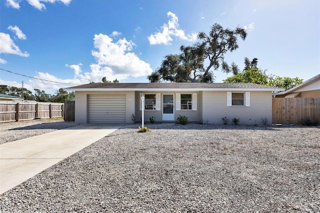 single story home with a garage