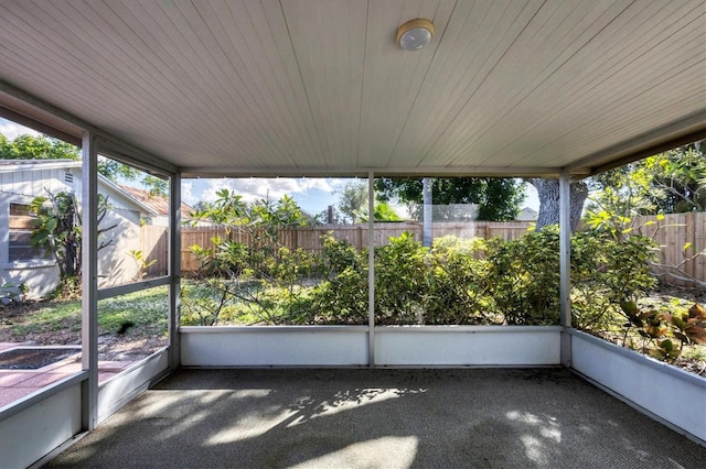 unfurnished sunroom with a healthy amount of sunlight