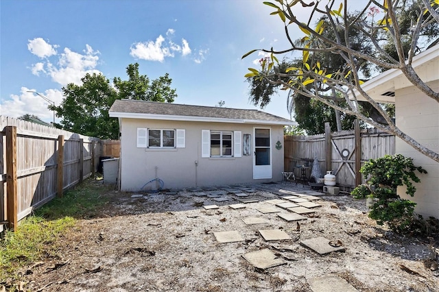 rear view of property with a patio area