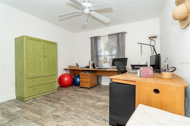 office space with wood-type flooring and ceiling fan