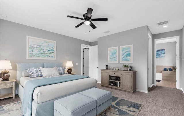 carpeted bedroom featuring ceiling fan