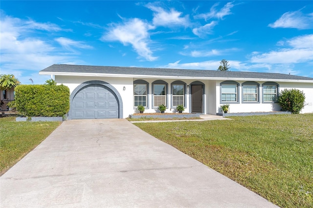 single story home with a front lawn and a garage