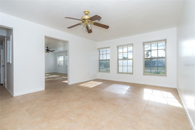 20 Annapolis Ln, Rotonda West, FL 33947 - spare room featuring baseboards and ceiling fan