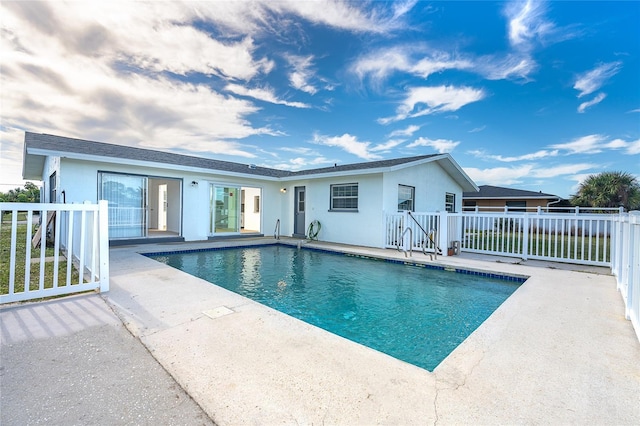 view of pool featuring a patio area