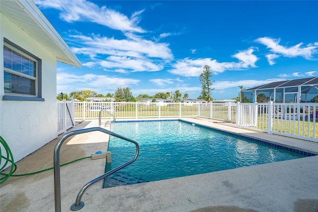 20 Annapolis Ln, Rotonda West, FL 33947 - view of swimming pool featuring a fenced in pool, fence, and a patio