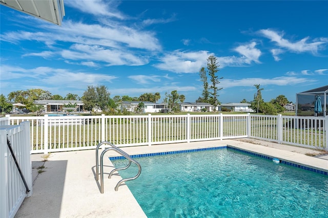 20 Annapolis Ln, Rotonda West, FL 33947 - view of swimming pool with a fenced in pool, a patio area, fence, and a residential view
