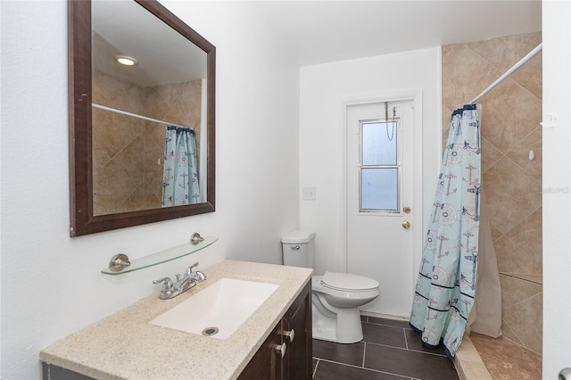 bathroom featuring vanity, tile patterned floors, and a shower with curtain