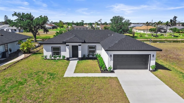 220 Mark Twain Ln, Rotonda West, FL 33947 - view of front of property with stucco siding, a shingled roof, an attached garage, driveway, and a residential view