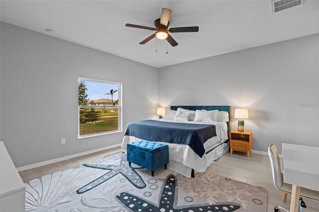220 Mark Twain Ln, Rotonda West, FL 33947 - bedroom featuring a ceiling fan, baseboards, visible vents, and light wood-type flooring