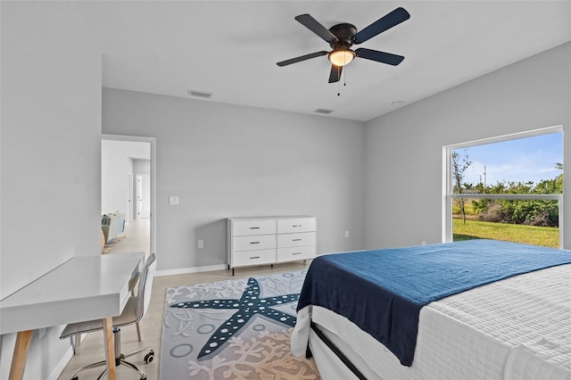 220 Mark Twain Ln, Rotonda West, FL 33947 - bedroom featuring baseboards, visible vents, ceiling fan, and light wood finished floors