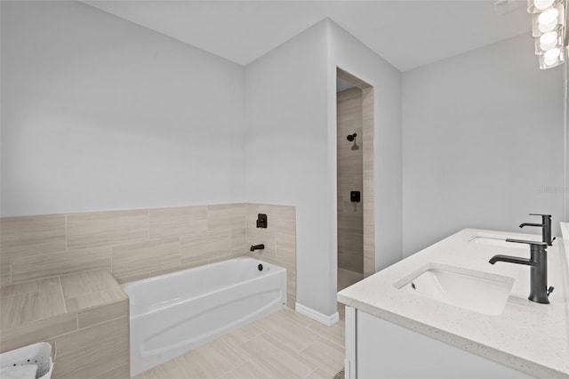 220 Mark Twain Ln, Rotonda West, FL 33947 - full bathroom with double vanity, a tile shower, a sink, and a bath