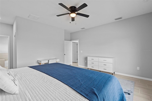 220 Mark Twain Ln, Rotonda West, FL 33947 - bedroom with baseboards and a ceiling fan