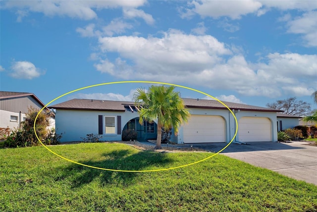 ranch-style home with a front lawn and a garage