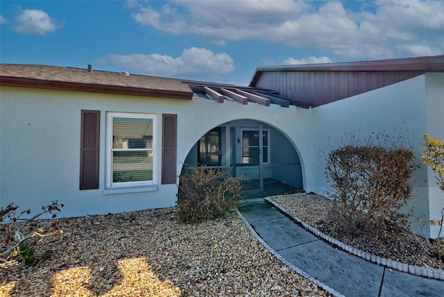 612 Deerwood Ave Unit 169, Englewood, FL 34223 - view of exterior entry with stucco siding