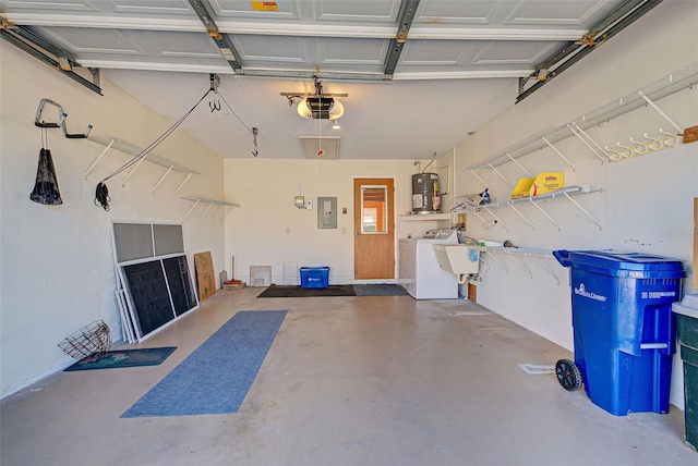 garage featuring water heater, electric panel, and a garage door opener