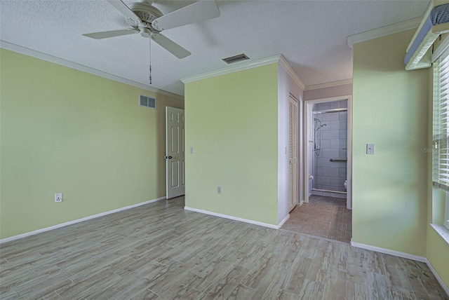 612 Deerwood Ave Unit 169, Englewood, FL 34223 - empty room with wood finished floors, ornamental molding, a ceiling fan, and baseboards