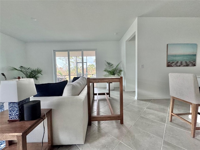 living room featuring light tile patterned flooring