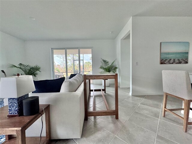 19060 Moscato Ct, Venice, FL 34293 - living area with a desk and baseboards