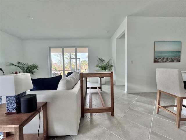 living room with light tile patterned floors