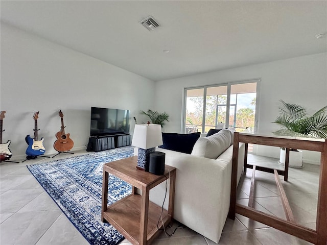 living room featuring tile patterned flooring