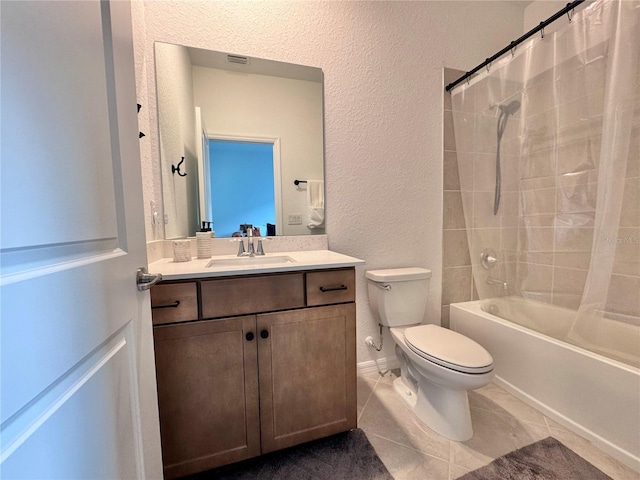 19060 Moscato Ct, Venice, FL 34293 - full bath with a textured wall, toilet, vanity, shower / bath combination with curtain, and tile patterned flooring