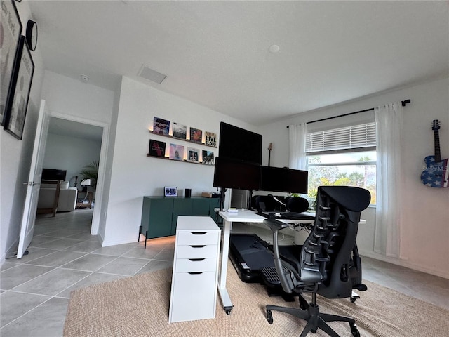 office space featuring light tile patterned floors