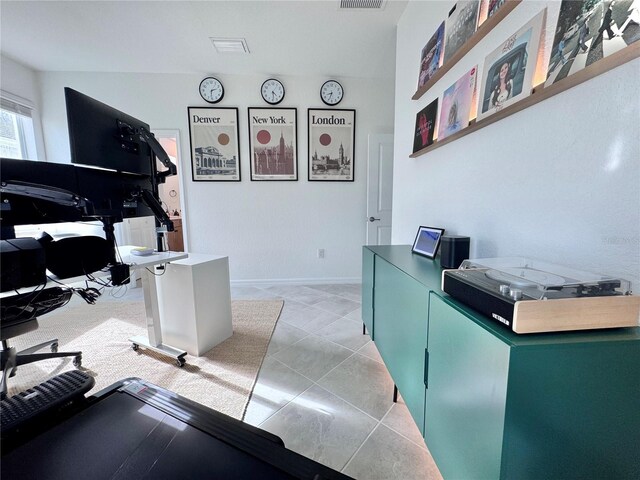19060 Moscato Ct, Venice, FL 34293 - home office featuring light tile patterned flooring and baseboards
