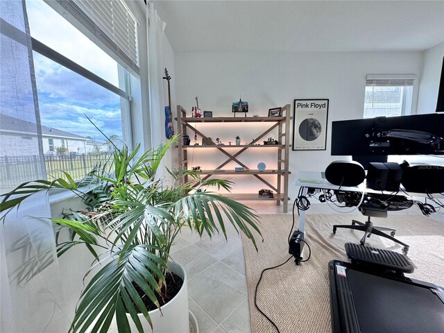 19060 Moscato Ct, Venice, FL 34293 - exercise room with tile patterned flooring
