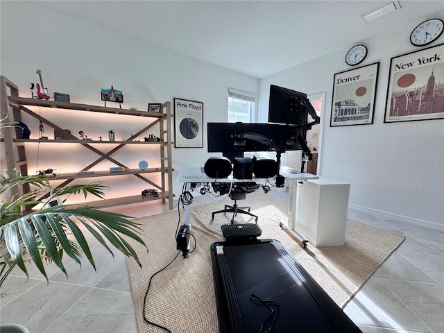 workout room with light tile patterned floors