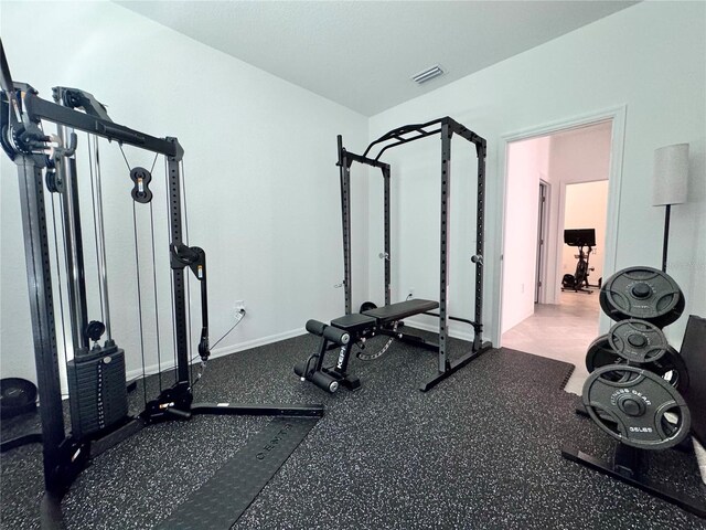 19060 Moscato Ct, Venice, FL 34293 - workout area with baseboards