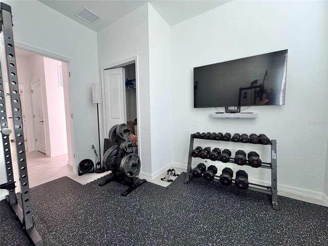 19060 Moscato Ct, Venice, FL 34293 - workout room with baseboards