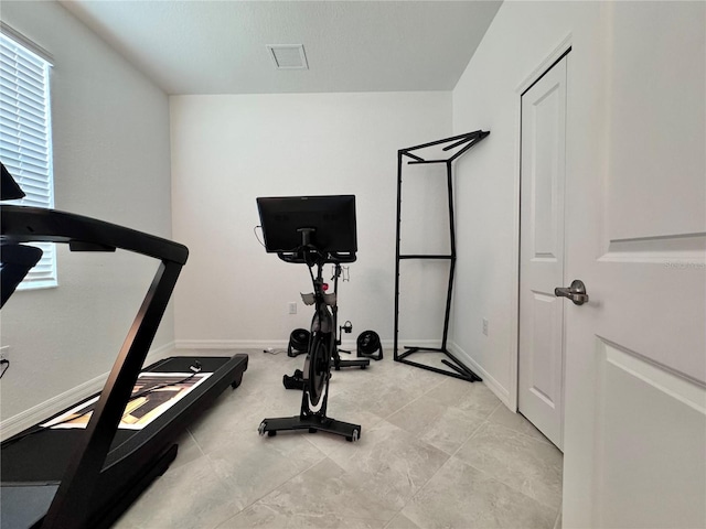 19060 Moscato Ct, Venice, FL 34293 - workout area featuring baseboards