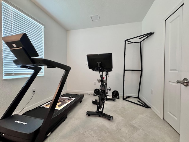 19060 Moscato Ct, Venice, FL 34293 - workout room with baseboards