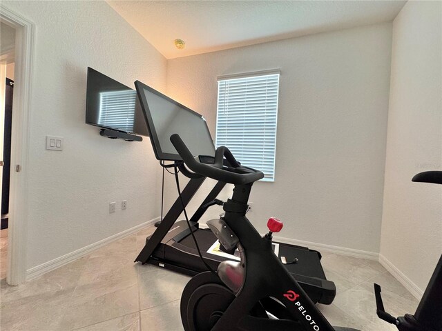19060 Moscato Ct, Venice, FL 34293 - workout room with baseboards