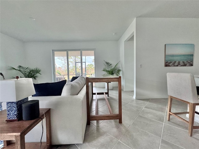 19060 Moscato Ct, Venice, FL 34293 - living room featuring a desk and baseboards