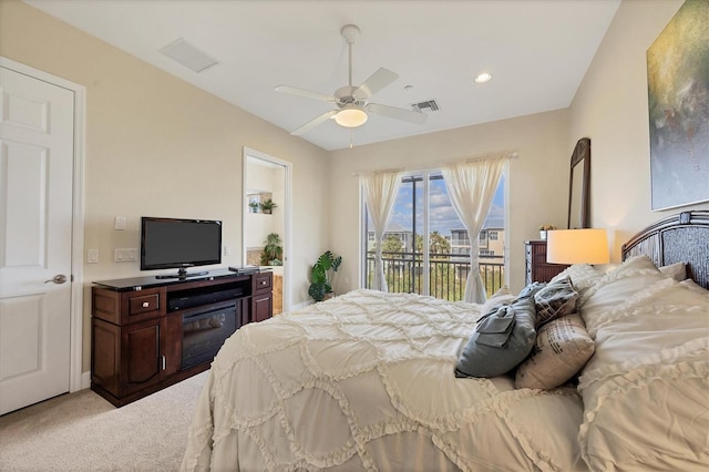 bedroom with access to outside, light colored carpet, and ceiling fan