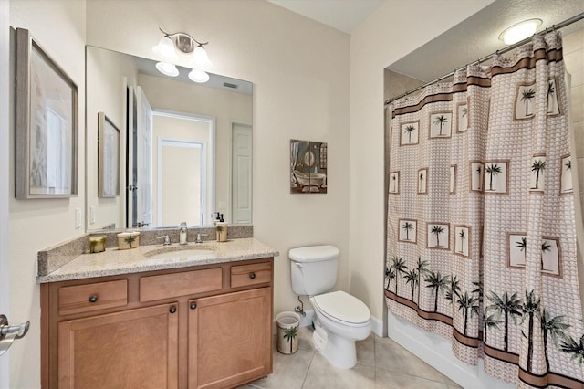 full bathroom featuring vanity, shower / bathtub combination with curtain, tile patterned floors, and toilet