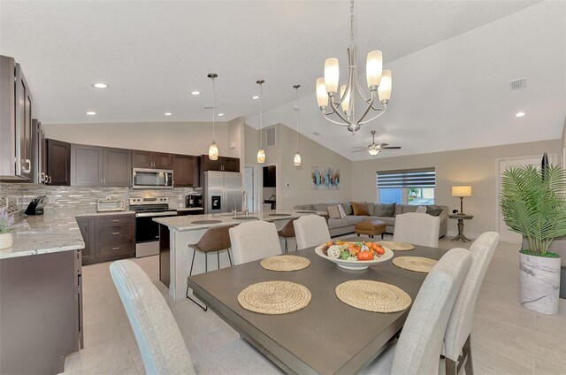 2775 Wyola Ave, North Port, FL 34286 - dining space with recessed lighting, light tile patterned flooring, visible vents, and ceiling fan with notable chandelier
