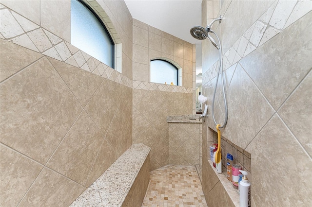 bathroom featuring tiled shower