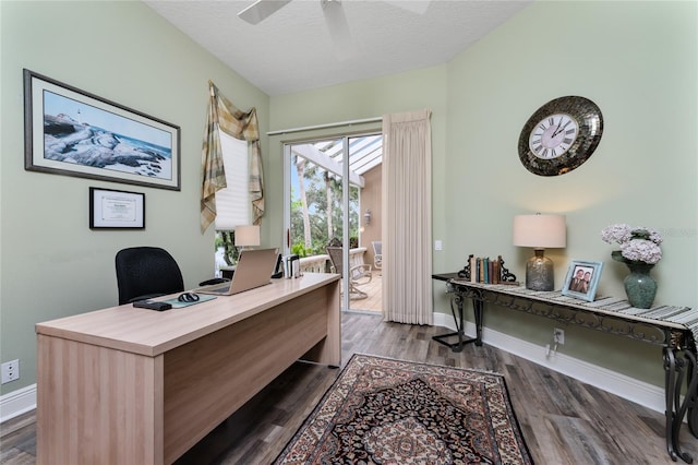 office with dark wood-type flooring, ceiling fan, and a textured ceiling