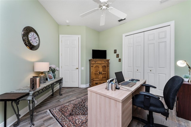 office space featuring hardwood / wood-style floors and ceiling fan