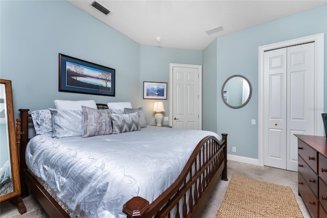 bedroom with carpet and a closet