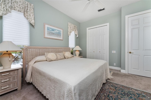 bedroom with carpet flooring, ceiling fan, and a closet