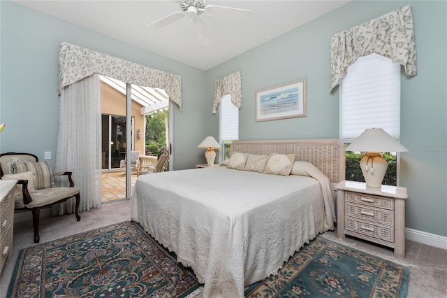 carpeted bedroom featuring access to outside and ceiling fan