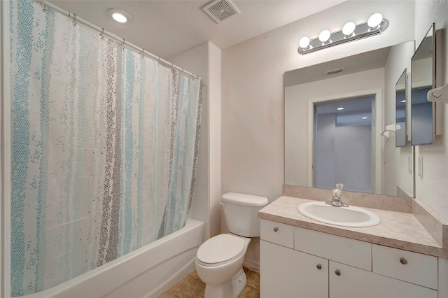 full bathroom with vanity, toilet, shower / bath combination with curtain, and tile patterned flooring