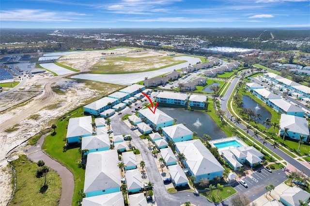 birds eye view of property featuring a water view