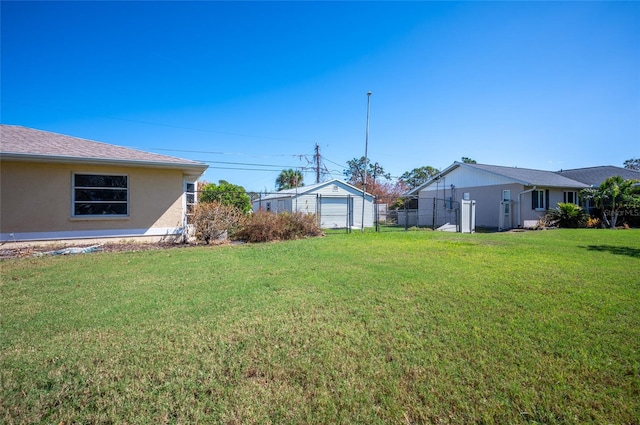 view of yard with a garage