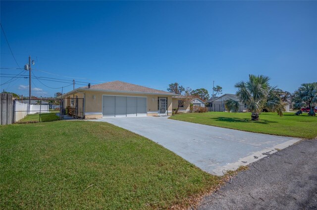 single story home with a front yard and a garage