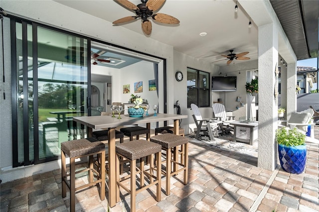 view of patio / terrace with ceiling fan