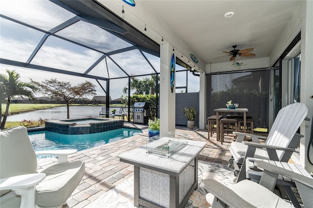 view of swimming pool with a patio, a water view, and glass enclosure